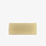 Après-shampoing solide à l'huile de chanvre, soin naturel pour cheveux secs et abîmés, hydratation et brillance.